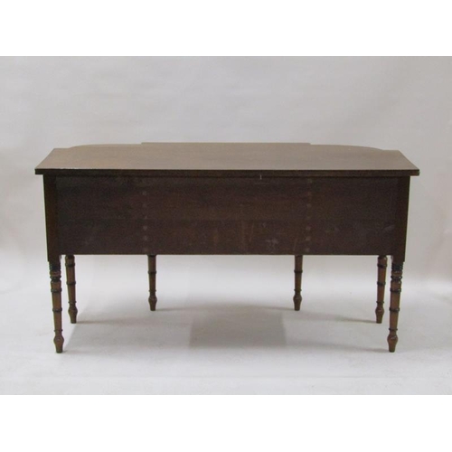 2071 - An early 19c mahogany sideboard with a central frieze drawer over a lower pull out drawer with arche... 