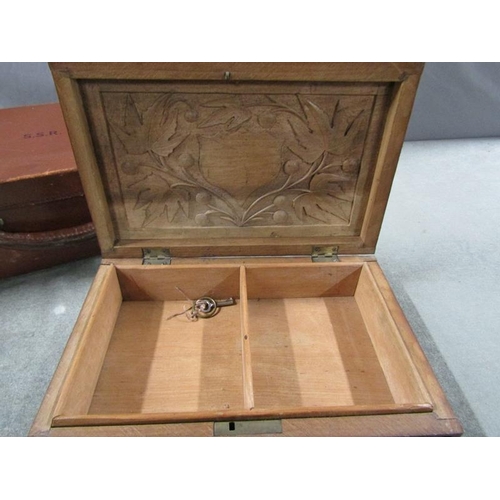 1392 - Late Victorian carved wooden cigar box (28cms w) and a small leather case