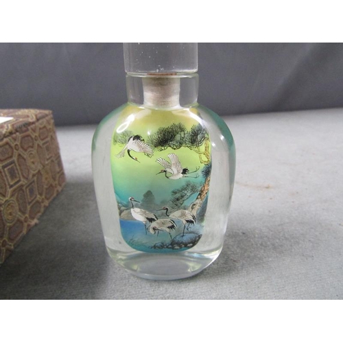 1478 - Chinese scent bottle decorated with Cranes, 10cms h boxed