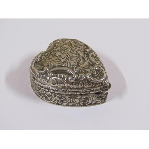 1543 - Two silver heart shaped trinket boxes with embossed decoration, each 5cm w. (one a/f)