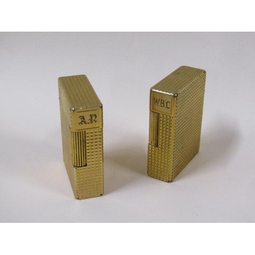 1567 - Two Dupont of Paris gilt metal pocket lighters