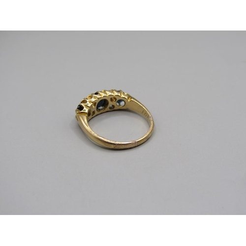 1609 - An 18ct gold sapphire and diamond set ring, size L/M.