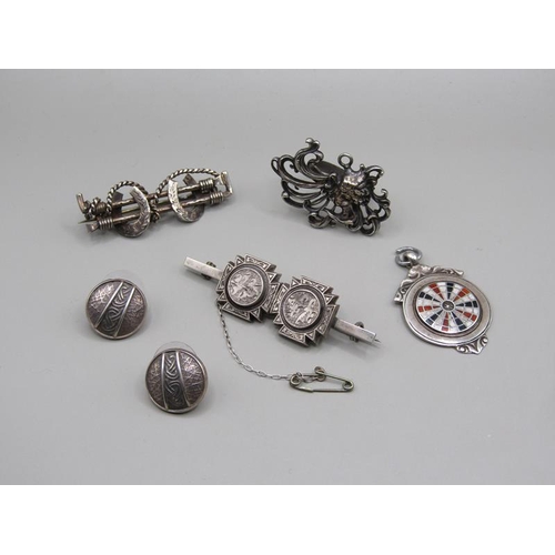 1621 - A collection of silver brooches and earrings.