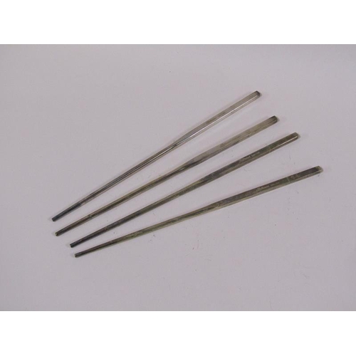 1666 - Two pairs of white metal chopsticks