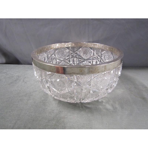 1774 - Cut glass fruit bowl with silver rim, 25cm diam