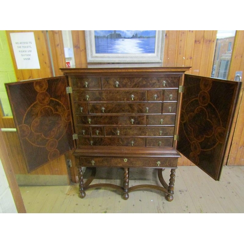 2013 - William and Mary style walnut cabinet on stand, cabinet fitted six long drawers and nine short drawe... 