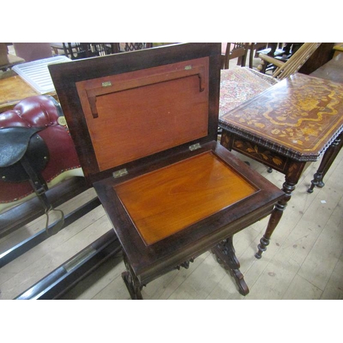 2054 - 19c Rosewood needlework table with hinged rising lid with pouch supported on carved stretcher frame ... 