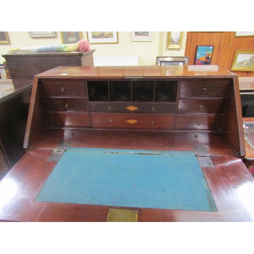 2061 - Early 19c mahogany inlaid and cross banded bureau with fall front having a shell motif, enclosing a ... 