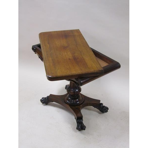 2059 - A William IV rosewood fold over card table with a deep carved and moulded frieze, supported on a lob... 