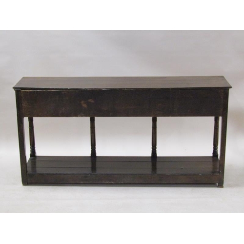 2068 - A late 18c/early 19c English oak three drawer dresser base with pot board, supported on ring turned ... 