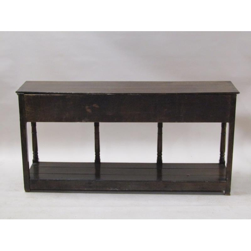 2068 - A late 18c/early 19c English oak three drawer dresser base with pot board, supported on ring turned ... 