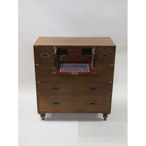 2069 - A 19c mahogany military chest of split construction, having a central secretaire with fall front and... 