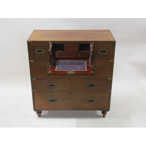 2069 - A 19c mahogany military chest of split construction, having a central secretaire with fall front and... 