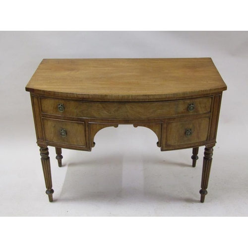 2073 - An early 19c mahogany bow front kneehole side table, having one long drawer over two short flanking ... 