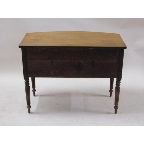 2073 - An early 19c mahogany bow front kneehole side table, having one long drawer over two short flanking ... 