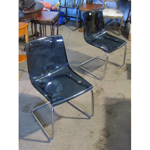 634 - TWO PLASTIC AND CHROME CHAIRS