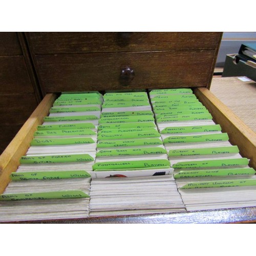 1829 - Two fourdrawer cabinets of cigarette cards and associated catalogues