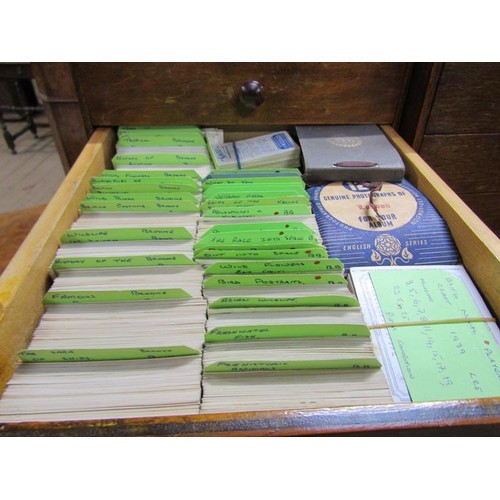 1829 - Two fourdrawer cabinets of cigarette cards and associated catalogues