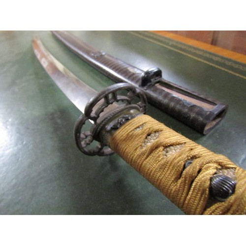 1360 - Japanese sword in sheath, 75cms l