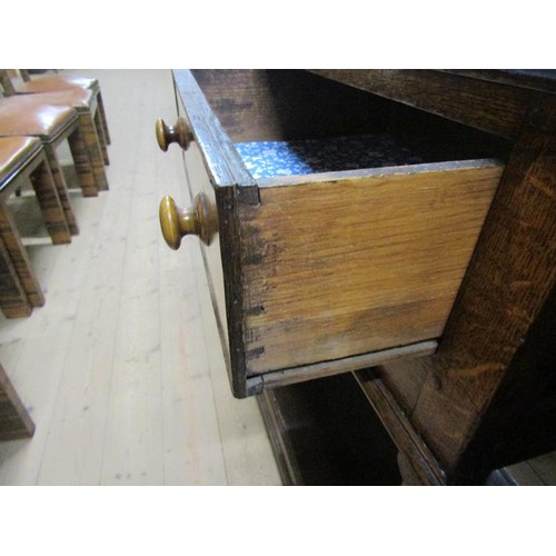 2068 - A late 18c/early 19c English oak three drawer dresser base with pot board, supported on ring turned ... 