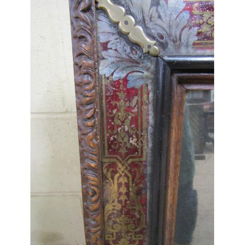 2012 - An 18c Italian wall mirror, the frame painted red with gilt detailing and mounted with original sect... 