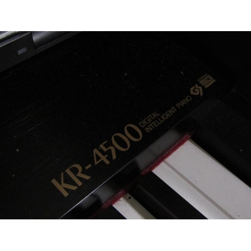 519 - ROLAND KR-4500 KEYBOARD AND STOOL