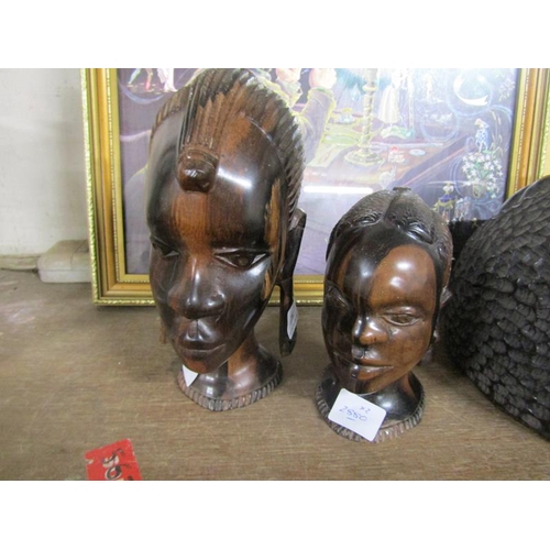 12 - TWO CARVED AFRICAN HEADS - FEMALES