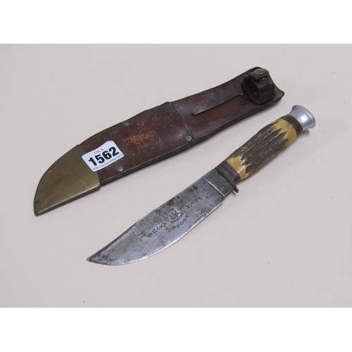 1562 - TAYLORS SCOUT KNIFE - I WITNESS WITH CARVED HORN HANDLE AND LEATHER SHEATH