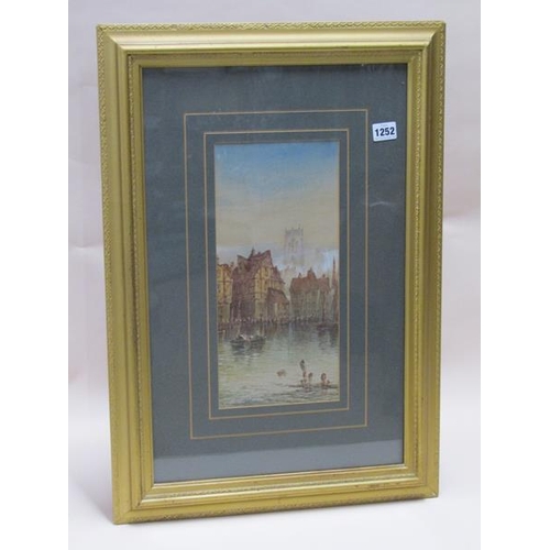 1252 - T MORTIMER, A CONTINENTAL WATERWAY WITH FIGURES ON THE QUAYSIDE.  SIGNED WATERCOLOUR F/G 35 x 16cms