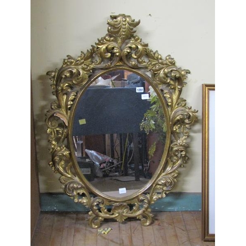 1297 - ORNATE GILT WOOD OVAL WALL MIRROR, OVERALL 100CM X 70CM