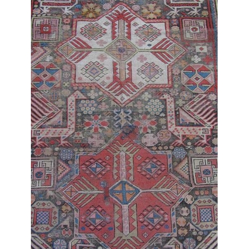 2034 - ORIENTAL RUG OF MULTI COLOURED GROUND