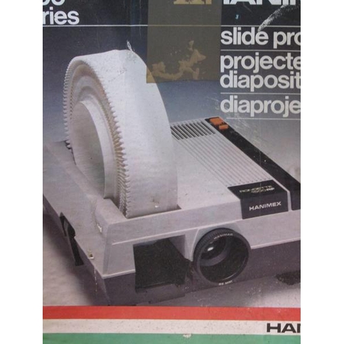 642 - SLIDE PROJECTOR AND MAGAZINE RACK