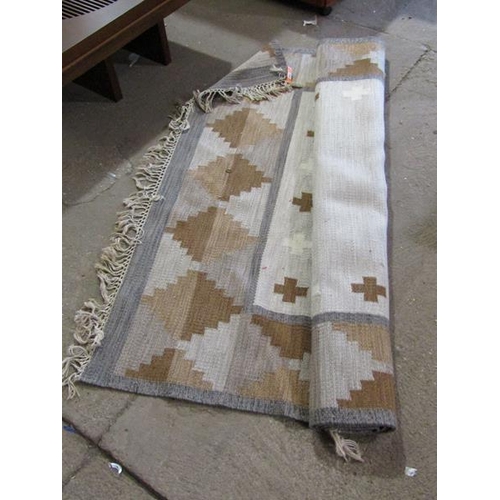 712 - BROWN & BEIGE RUG