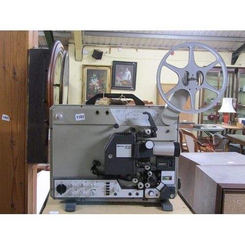 1103 - BOLEX 421 PROJECTOR ON STAND, PROJECTOR 42CM H AND REELS