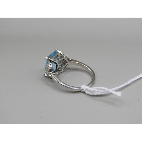 1362 - PLATINUM PLATED SILVER BLUE TOPAZ RING SIZE N 1/2