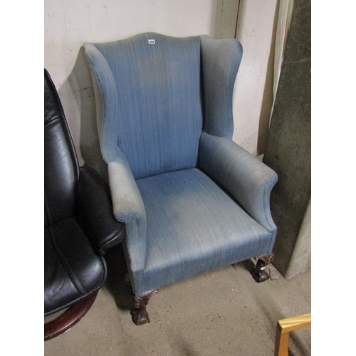 688 - EARLY 20C WINGBACK ARMCHAIR