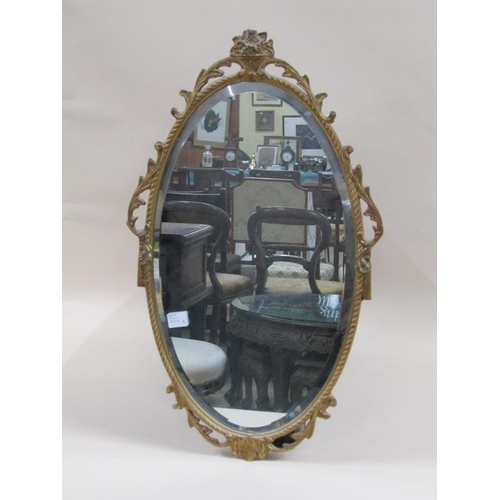 1272A - GILT FRAMED OVAL WALL MIRROR., 66CM X 39CM