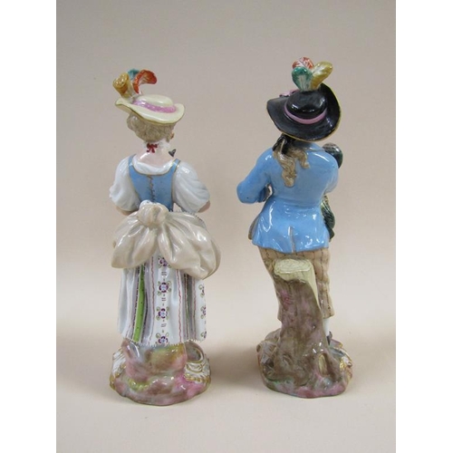 143 - A pair of 19c Meissen porcelain figures of a man and a lady, man holding a cockerel, lady holding a ... 