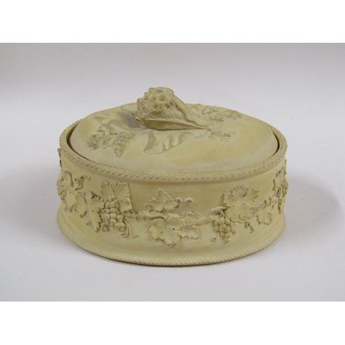 144 - A 19c Wedgwood caneware tureen and cover with liner, decorated in relief with fruiting vine and the ... 