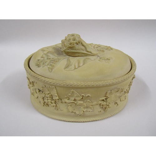 144 - A 19c Wedgwood caneware tureen and cover with liner, decorated in relief with fruiting vine and the ... 