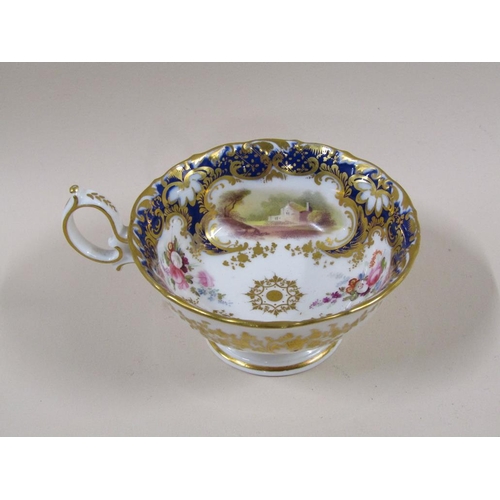 145 - An early 19c Rockingham style part tea service with hand painted panels of various landscapes and bu... 