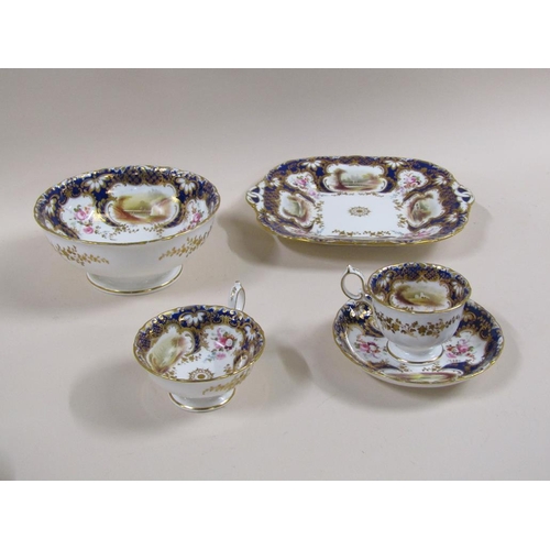 145 - An early 19c Rockingham style part tea service with hand painted panels of various landscapes and bu... 