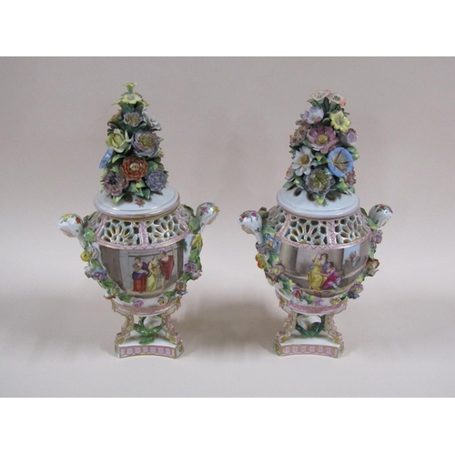 147 - A pair of 19c Carl Thieme Potschappel vases and covers with reticulated upper rims, female mask hand... 