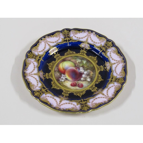 148 - An early 20c Royal Worcester hand painted fruit plate by R. Sebright, painted on a cobalt blue and p... 