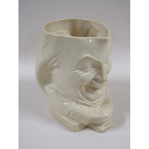 151 - A 1920's Ashstead pottery character jug by Percy Metcalfe depicting Lloyd George, 19cm h.