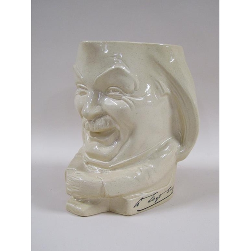 151 - A 1920's Ashstead pottery character jug by Percy Metcalfe depicting Lloyd George, 19cm h.