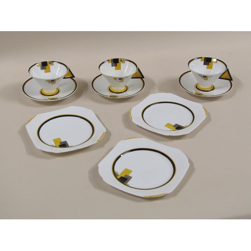 153 - Three Art Deco Shelley Vogue yellow block tea trios, pattern 11787, comprising three cups, 7cm h, th... 