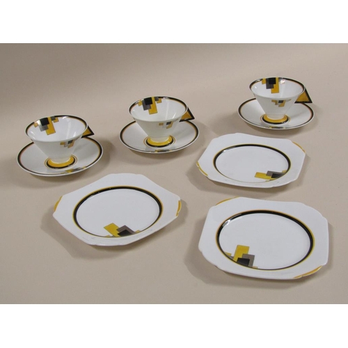 153 - Three Art Deco Shelley Vogue yellow block tea trios, pattern 11787, comprising three cups, 7cm h, th... 