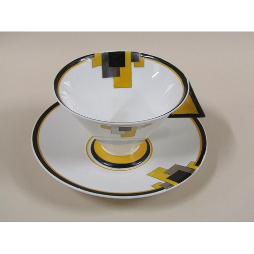 153 - Three Art Deco Shelley Vogue yellow block tea trios, pattern 11787, comprising three cups, 7cm h, th... 