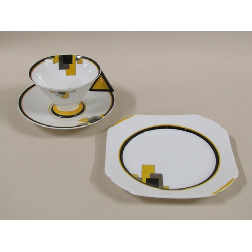 153 - Three Art Deco Shelley Vogue yellow block tea trios, pattern 11787, comprising three cups, 7cm h, th... 